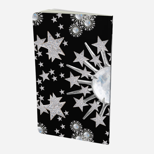 back cover of small notebook with celestial moonstone and stars design on a black background