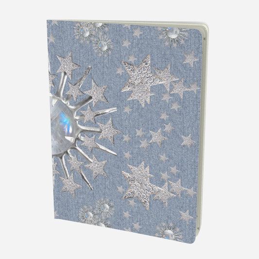 front cover of large notebook with celestial moonstone and stars design on a chambray denim look background