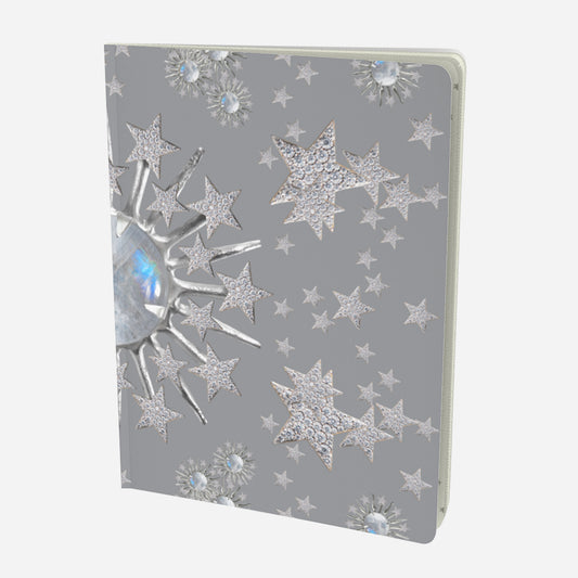 front cover of large notebook with celestial moonstone and stars design on a grey background