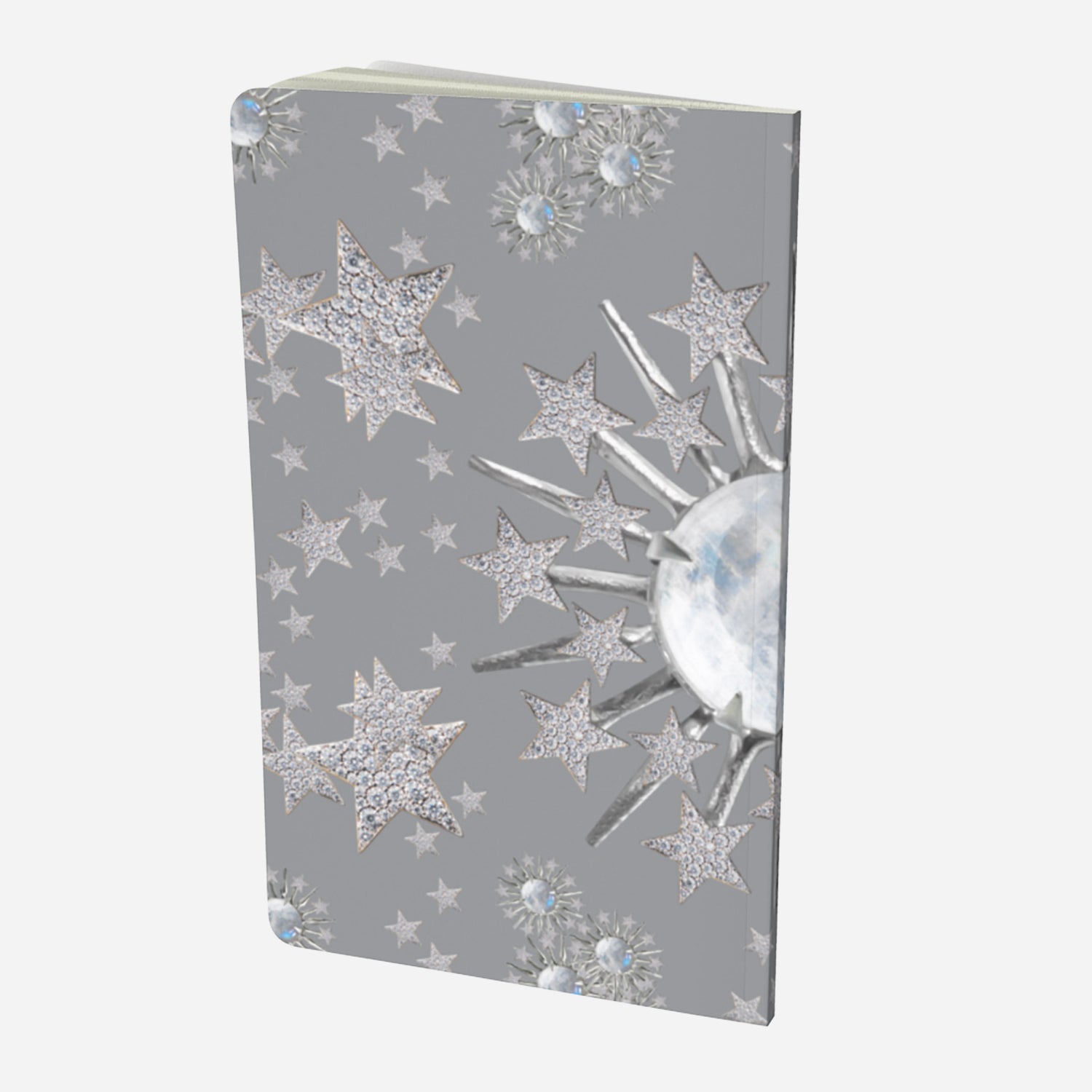 back cover of small notebook with celestial moonstone and stars design on a grey background
