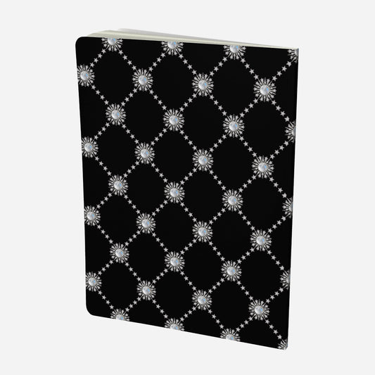 back cover of large notebook with celestial moonstone and stars lattice design on a black background