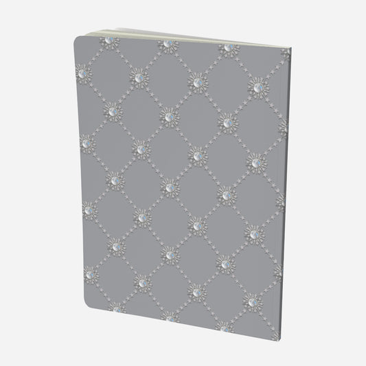back cover of large notebook with celestial moonstone and stars lattice design on a grey background