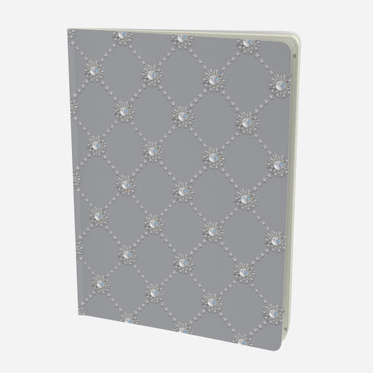 front cover of large notebook with celestial moonstone and stars lattice design on a grey background